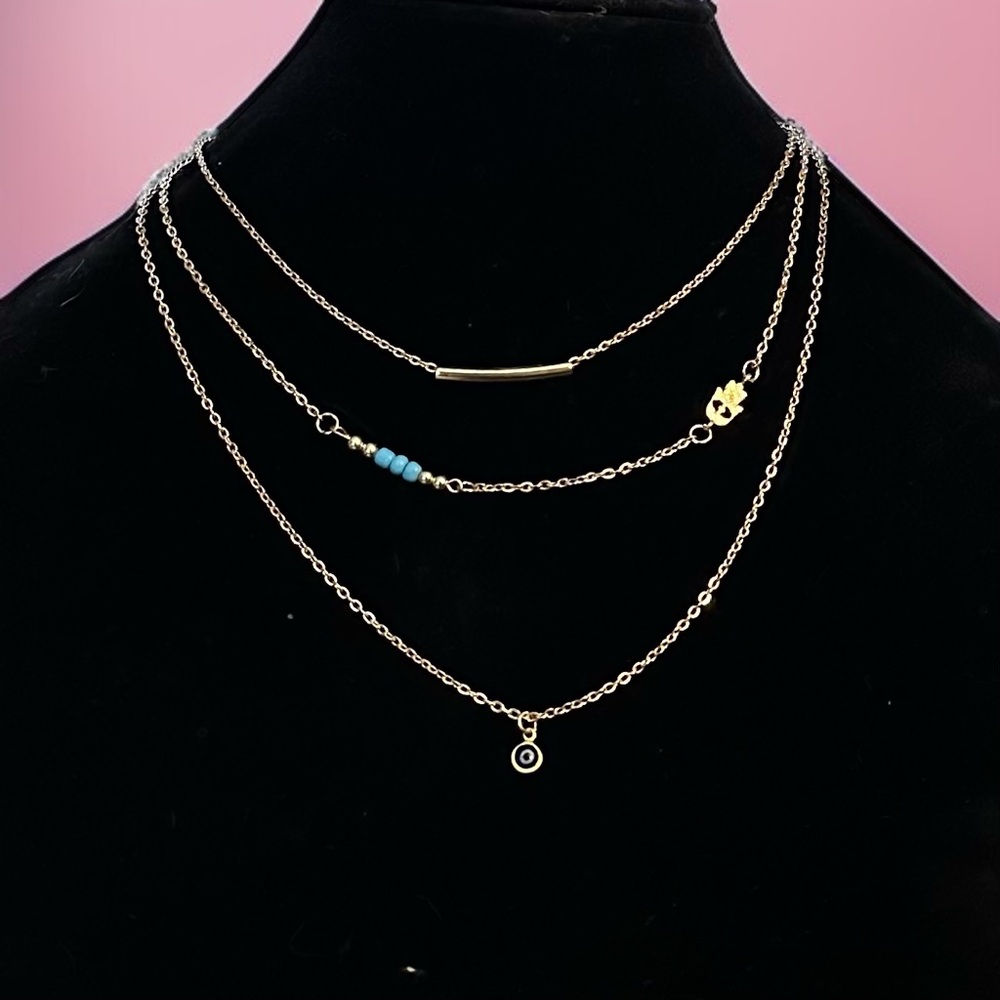 Gold tone triple strand layered Turkish evil eye necklace